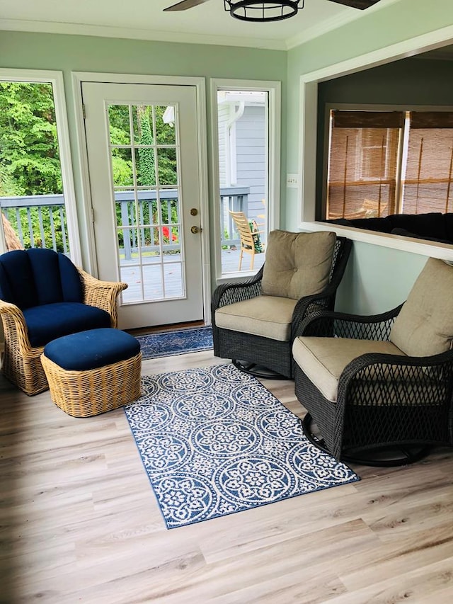 interior space with ceiling fan