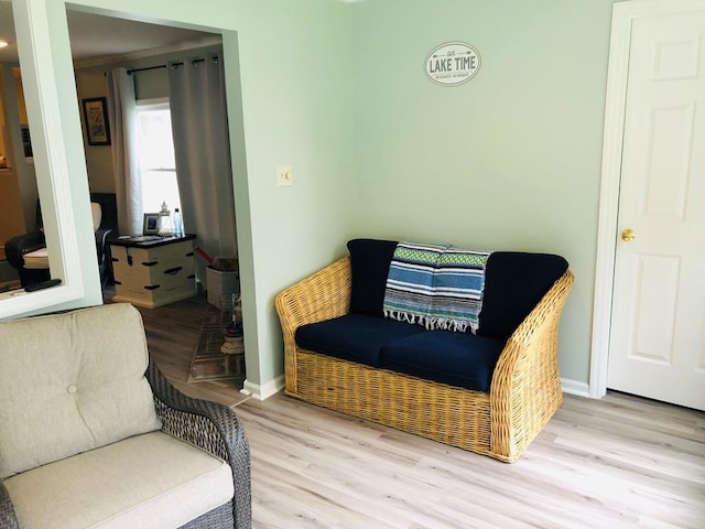 sitting room with light hardwood / wood-style flooring