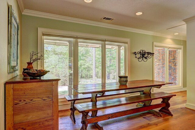 136 Kings Rd, Milledgeville, GA 31061 - dining area with ornamental molding, wood finished floors, and recessed lighting