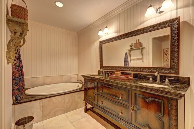 136 Kings Rd, Milledgeville, GA 31061 - full bath with ornamental molding, a bath, double vanity, and tile patterned flooring