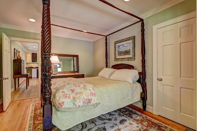136 Kings Rd, Milledgeville, GA 31061 - bedroom featuring light wood-style flooring, recessed lighting, and ornamental molding