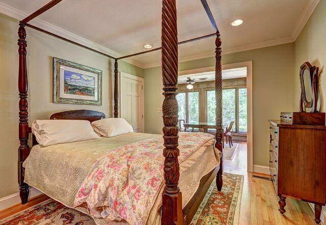 136 Kings Rd, Milledgeville, GA 31061 - bedroom with light wood-type flooring, crown molding, and recessed lighting
