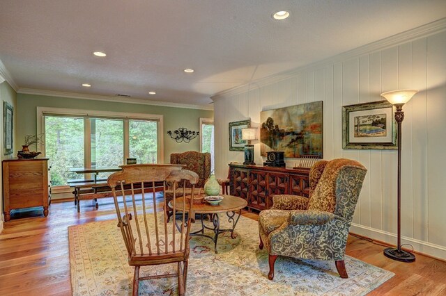 136 Kings Rd, Milledgeville, GA 31061 - living room with wood finished floors, recessed lighting, and ornamental molding