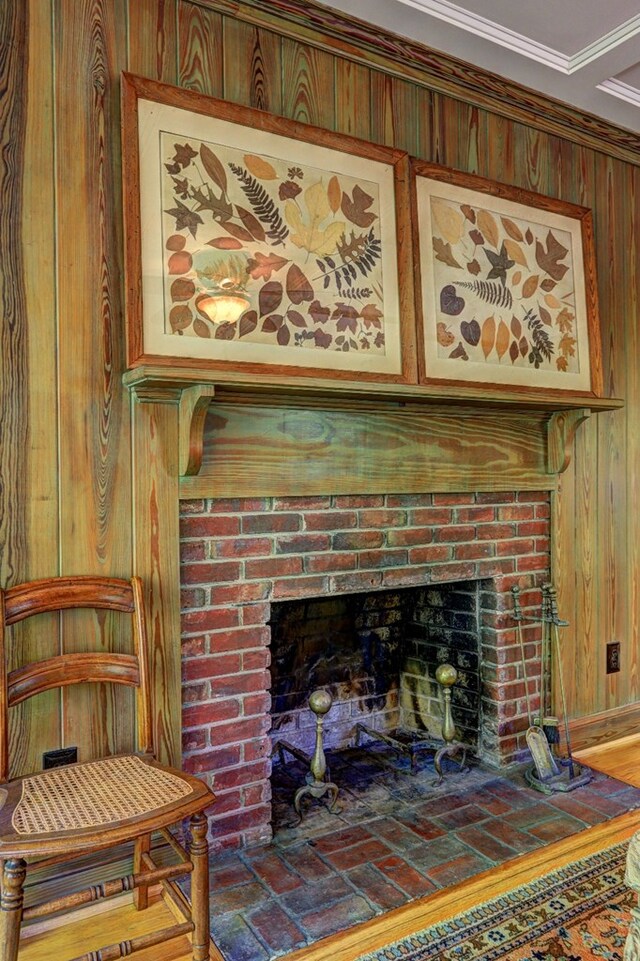 136 Kings Rd, Milledgeville, GA 31061 - detailed view of wood walls, a fireplace, and ornamental molding