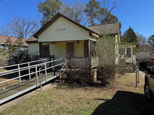 bungalow-style home with a porch