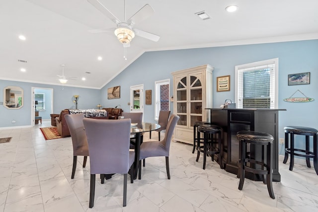 2122 Harbour Point Dr, Sparta, GA 31087 - dining room with a ceiling fan, crown molding, light marble finish floors, recessed lighting, and vaulted ceiling