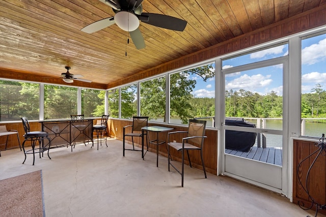 2122 Harbour Point Dr, Sparta, GA 31087 - sunroom with ceiling fan, a water view, and view of scattered trees