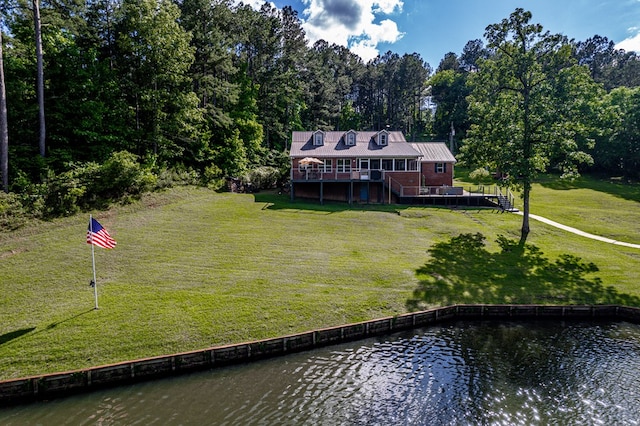 2122 Harbour Point Dr, Sparta, GA 31087 - rear view of property with a deck with water view and a lawn