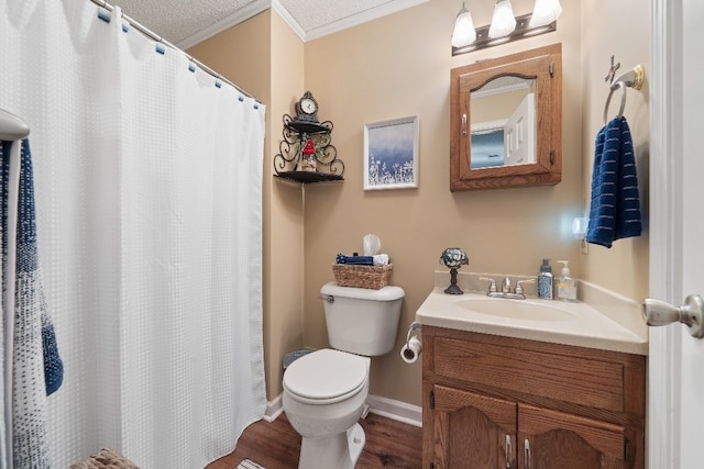 102 E Montego Ct, Milledgeville, GA 31061 - bathroom with vanity, ornamental molding, wood finished floors, a shower with shower curtain, and a textured ceiling
