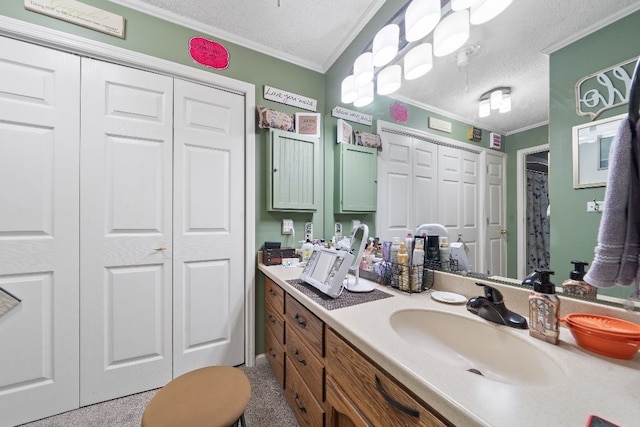 102 E Montego Ct, Milledgeville, GA 31061 - full bathroom featuring ornamental molding, a textured ceiling, vanity, and a closet
