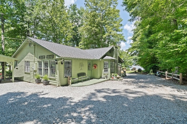 102 E Montego Ct, Milledgeville, GA 31061 - view of home's exterior with roof with shingles and driveway