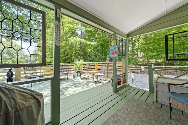 102 E Montego Ct, Milledgeville, GA 31061 - unfurnished sunroom with lofted ceiling and plenty of natural light