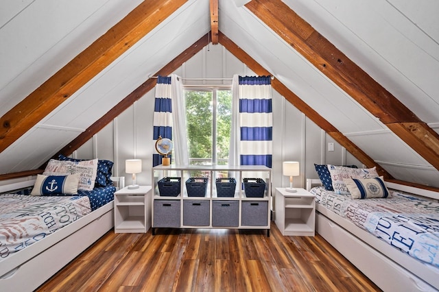 bedroom with dark hardwood / wood-style floors and lofted ceiling