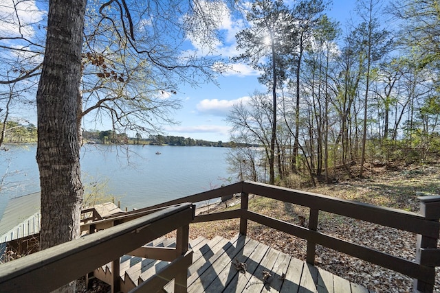 deck featuring a water view