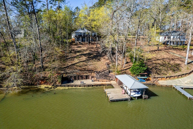 view of dock with a water view and stairway