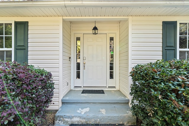 entrance to property with covered porch