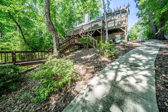 exterior space featuring a wooden deck