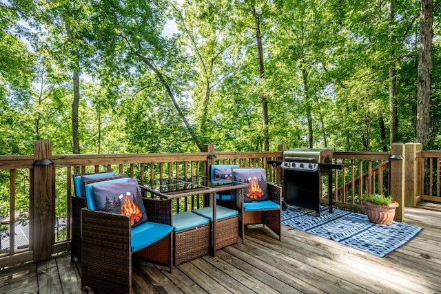 wooden terrace featuring grilling area