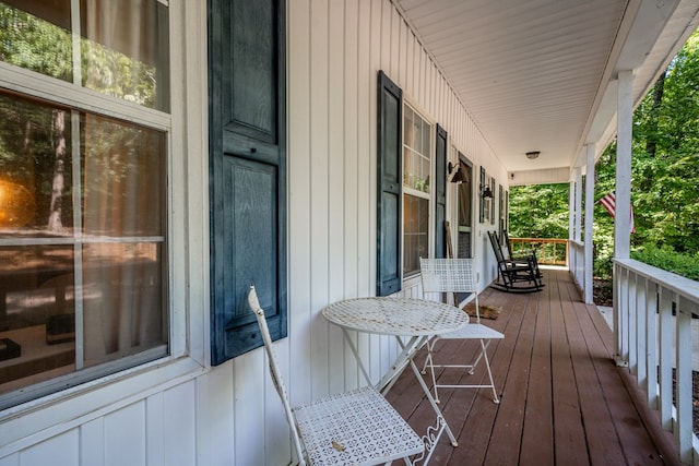 wooden deck featuring covered porch