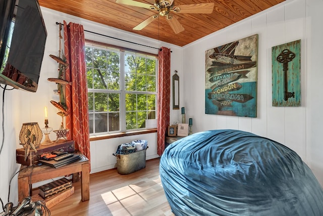 bedroom with hardwood / wood-style flooring, ceiling fan, and wooden ceiling