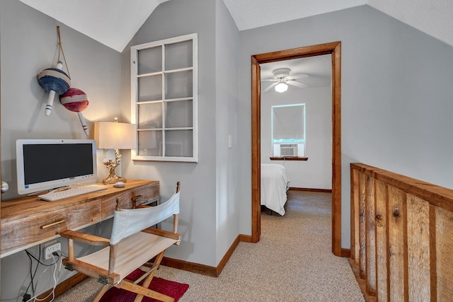 office space featuring a textured ceiling, light carpet, cooling unit, and vaulted ceiling