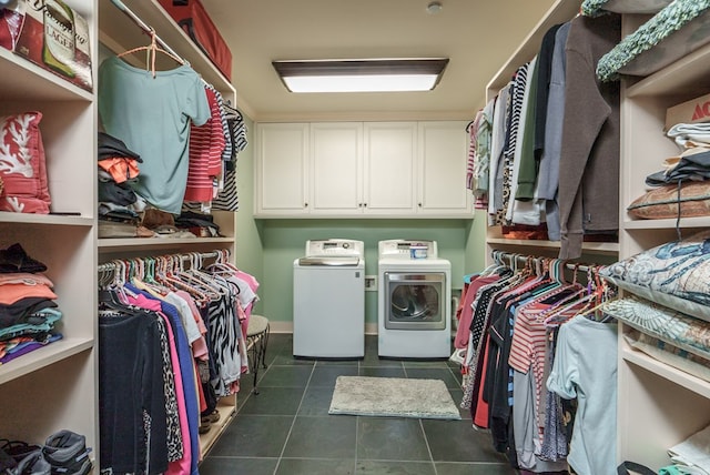 spacious closet featuring washing machine and clothes dryer