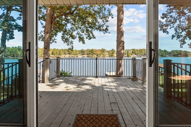 deck featuring a water view