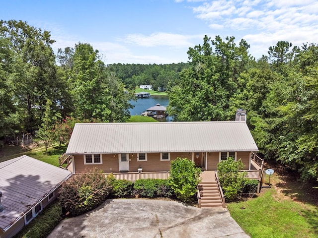 view of front of house featuring a water view