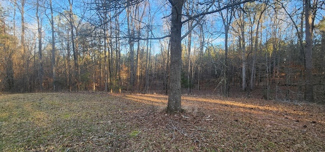 view of landscape with a view of trees