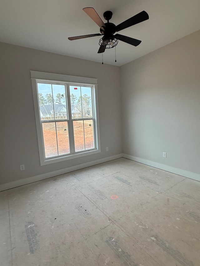 spare room with ceiling fan