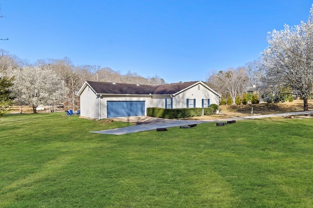 rear view of property featuring a lawn