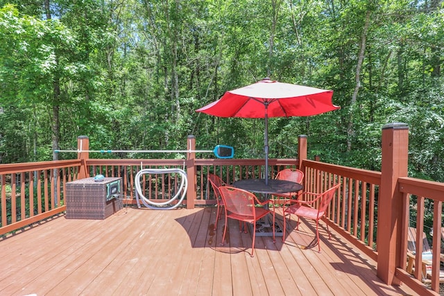 287 Napier Rd, Eatonton, GA 31024 - wooden deck featuring outdoor dining area