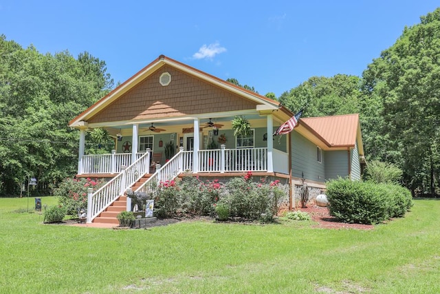287 Napier Rd, Eatonton, GA 31024 - bungalow-style house with ceiling fan, covered porch, and a front lawn