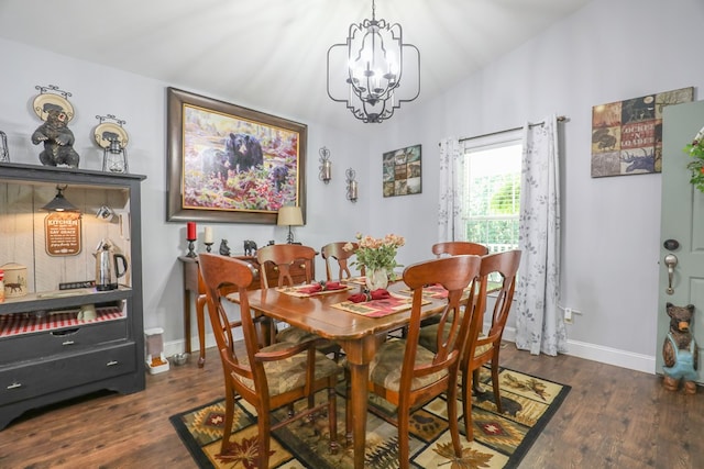 287 Napier Rd, Eatonton, GA 31024 - dining area featuring a chandelier, wood finished floors, and baseboards