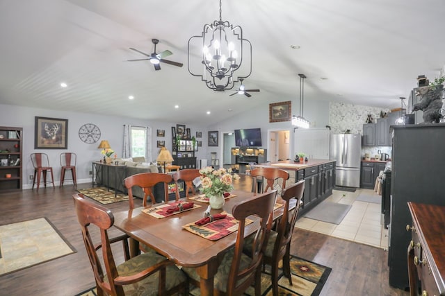 287 Napier Rd, Eatonton, GA 31024 - dining space featuring a ceiling fan, lofted ceiling, light wood-style floors, a chandelier, and recessed lighting