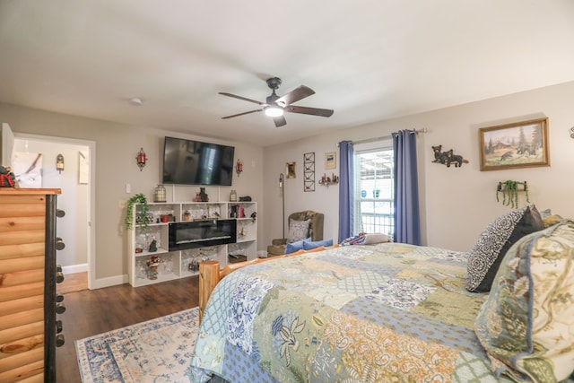 287 Napier Rd, Eatonton, GA 31024 - bedroom featuring wood finished floors, baseboards, and a ceiling fan