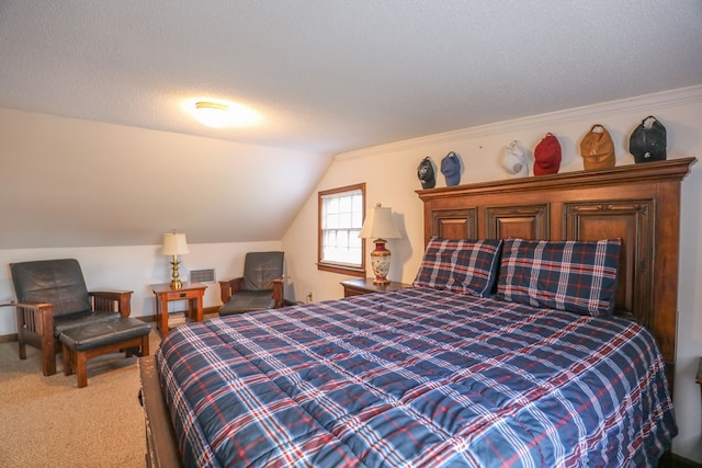 3715 Sinclair Dam Rd, Milledgeville, GA 31061 - carpeted bedroom with vaulted ceiling and a textured ceiling