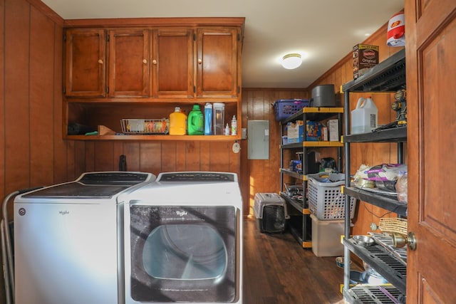 3715 Sinclair Dam Rd, Milledgeville, GA 31061 - laundry room with cabinet space, washing machine and dryer, wood walls, and dark wood finished floors