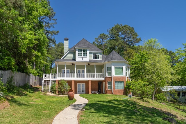 116 Island Dr, Milledgeville, GA 31061 - view of front of property featuring a ceiling fan, french doors, brick siding, a chimney, and stairs