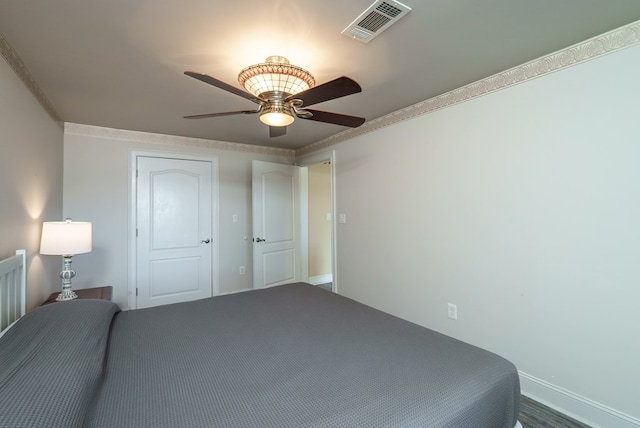116 Island Dr, Milledgeville, GA 31061 - bedroom featuring a ceiling fan, crown molding, and baseboards