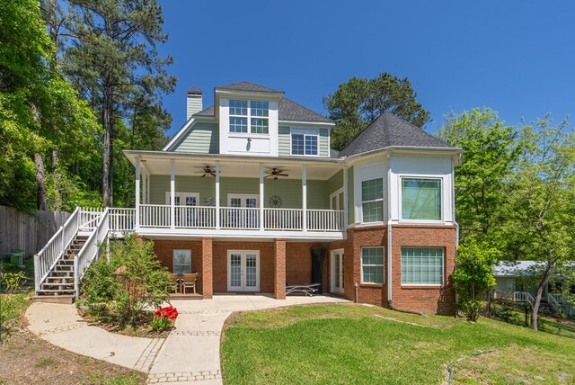 116 Island Dr, Milledgeville, GA 31061 - rear view of house with french doors, a ceiling fan, a chimney, brick siding, and stairs