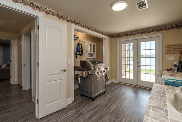 116 Island Dr, Milledgeville, GA 31061 - interior space featuring french doors, dark wood finished floors, and baseboards