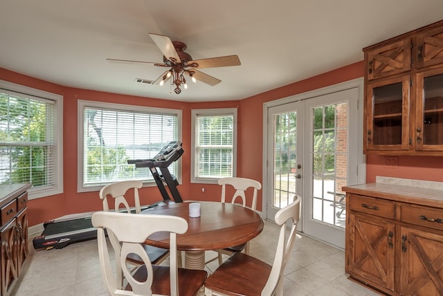 116 Island Dr, Milledgeville, GA 31061 - dining area featuring light tile patterned flooring, ceiling fan, and healthy amount of natural light
