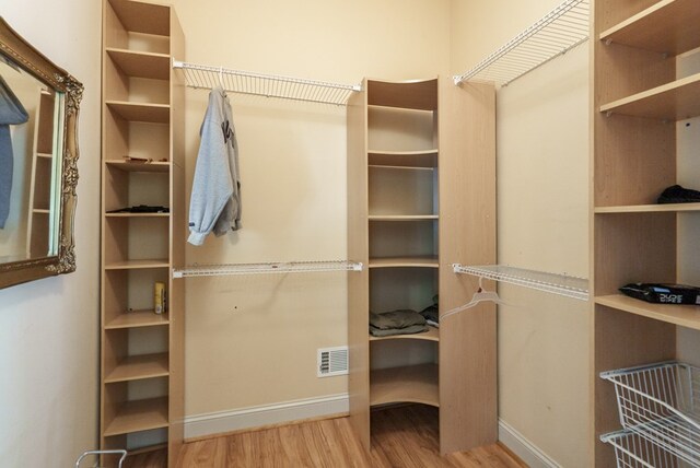 116 Island Dr, Milledgeville, GA 31061 - spacious closet with wood finished floors