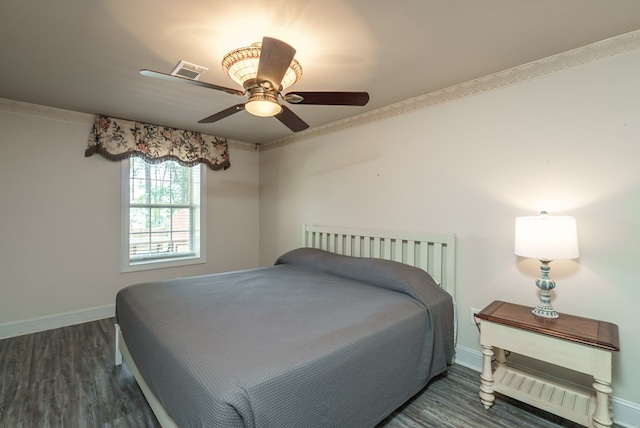 116 Island Dr, Milledgeville, GA 31061 - bedroom with wood finished floors, baseboards, a ceiling fan, and ornamental molding