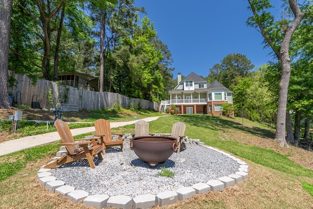 116 Island Dr, Milledgeville, GA 31061 - view of yard featuring a fire pit and a balcony