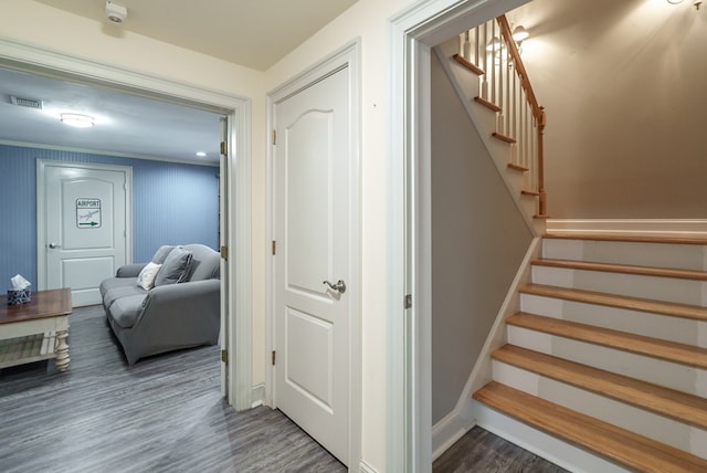 116 Island Dr, Milledgeville, GA 31061 - stairs featuring wood finished floors and baseboards
