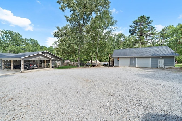 exterior space with a carport