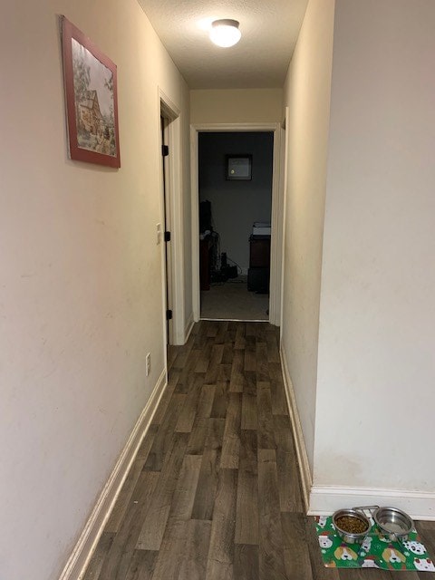 1683 Sara Hunter Ln, Milledgeville, GA 31061 - hall featuring dark wood-style floors and baseboards