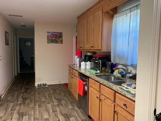 1683 Sara Hunter Ln, Milledgeville, GA 31061 - kitchen featuring stainless steel dishwasher, dark wood-style flooring, and light stone counters